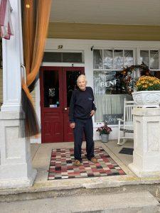 Current picture of Paul, age 95, standing in front of Benfer’s Furniture Store in September 2023.